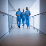 Doctors in scrubs walking